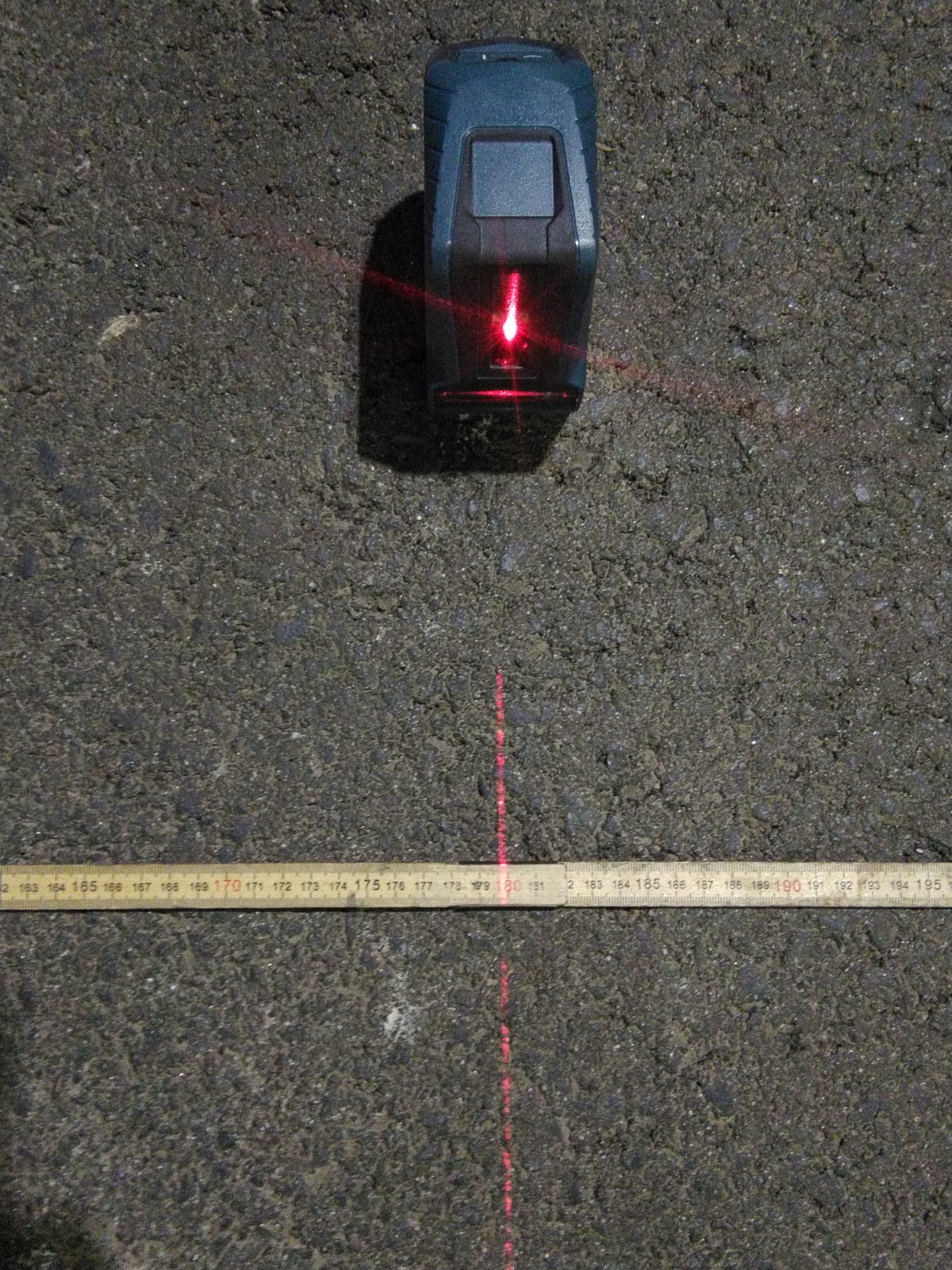 Lasernivellering på asfalt, nattarbete — Stockholm
